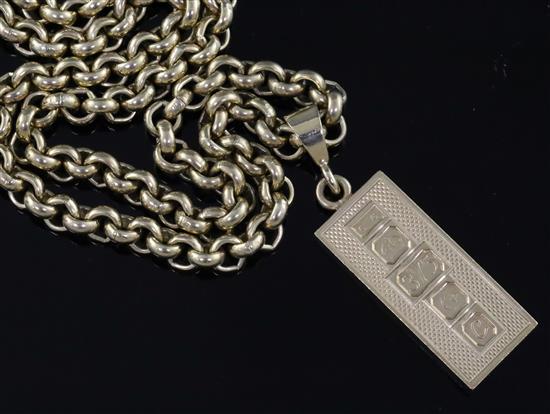 A heavy 9ct gold circular link chain with 1970s 9ct gold ingot pendant, gross weight 119.5 grams.